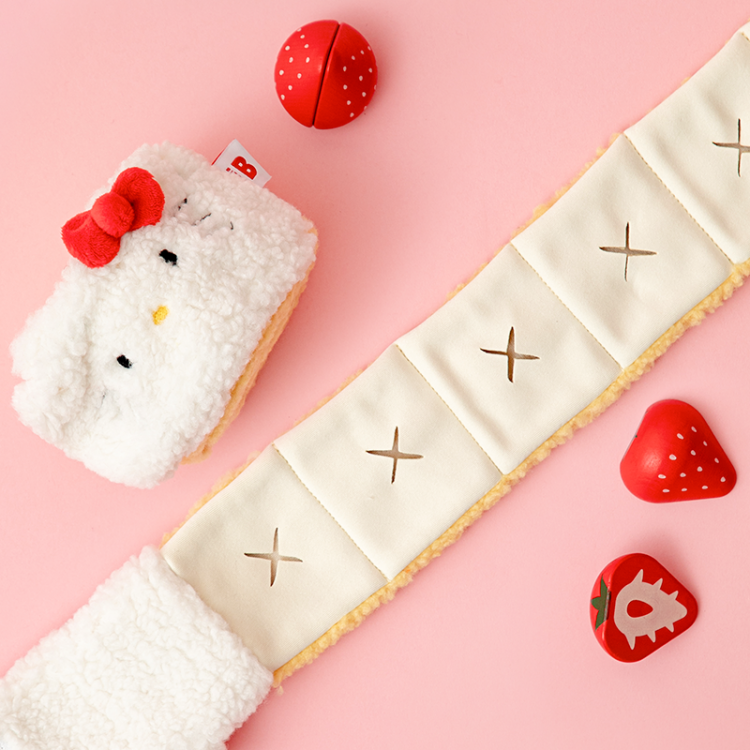 Bite Me Hello Kitty Roll Cake Nosework Toy