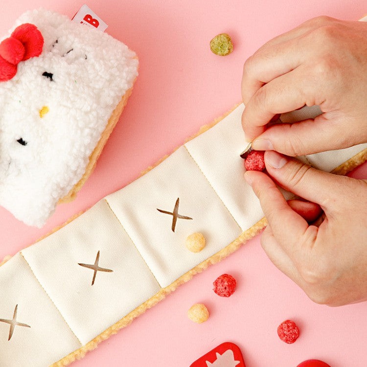 Bite Me Hello Kitty Roll Cake Nosework Toy